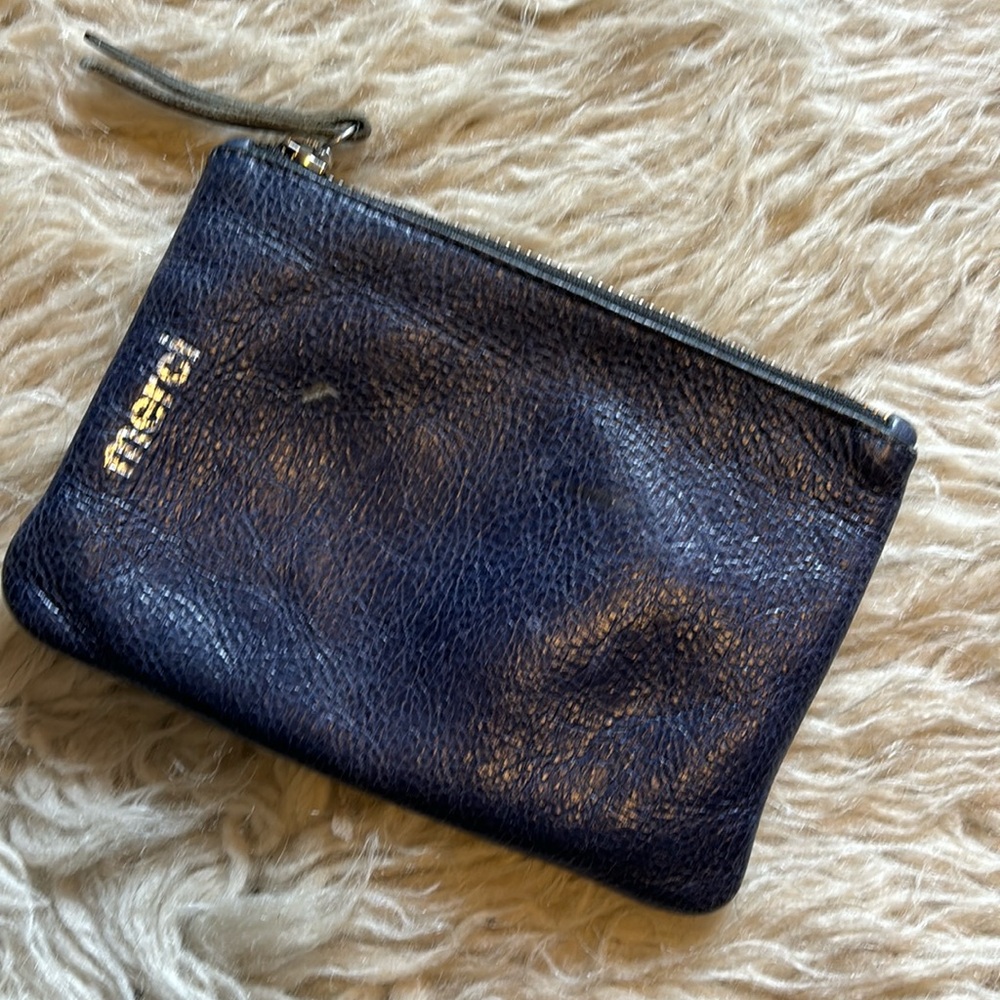 Merci popular store in Paris small clutch
